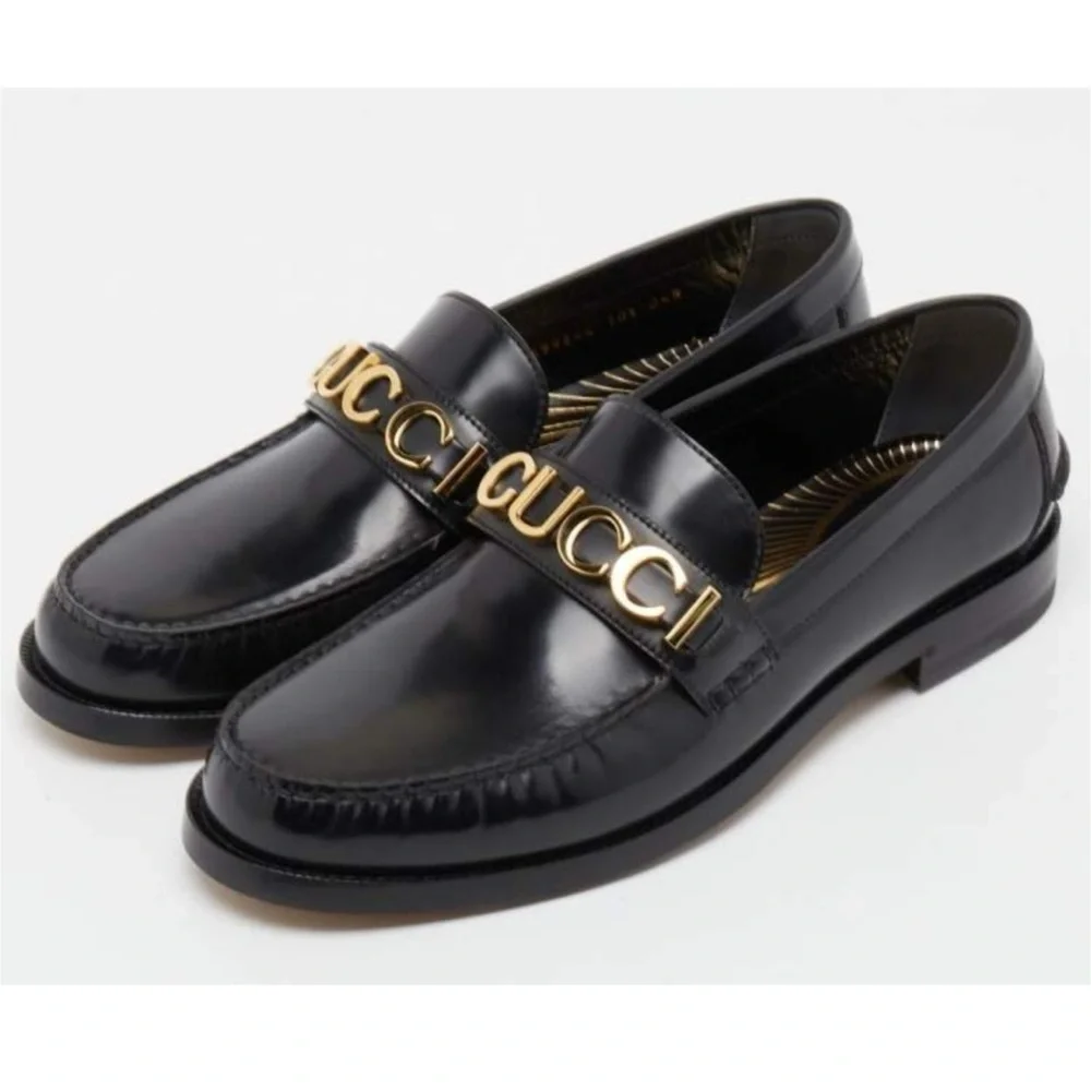Gucci gold logo embellished leather loafers size 12.5 made in Italy